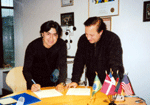 Signing the distribution contract with Fernando Lopez, representing SONY MUSIC and ENTERTAINMENT of Chile.
